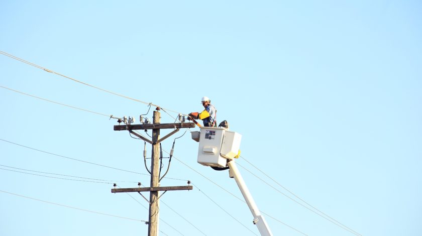 person working on power lines